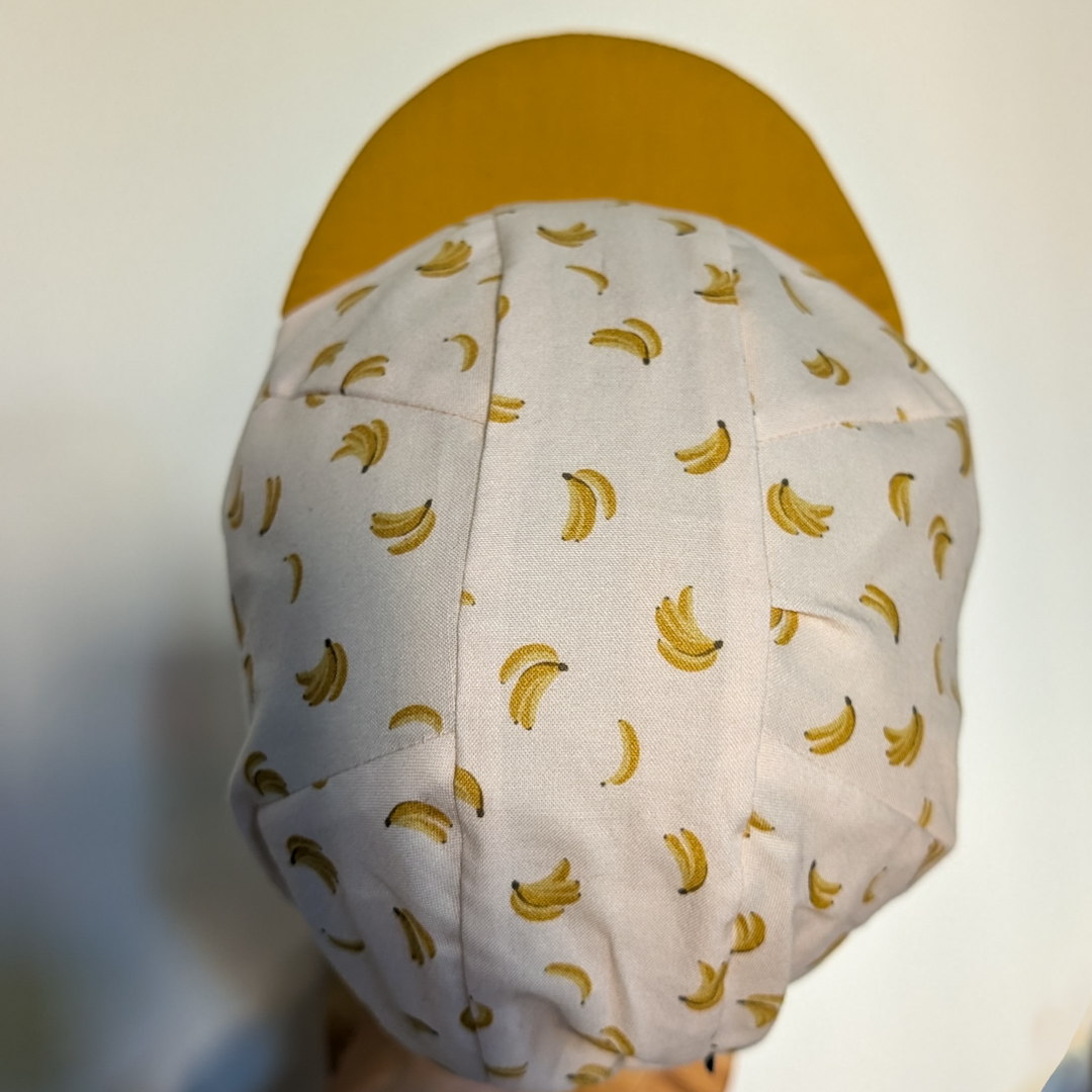 cycling Cap banane mit gelbem Schirm