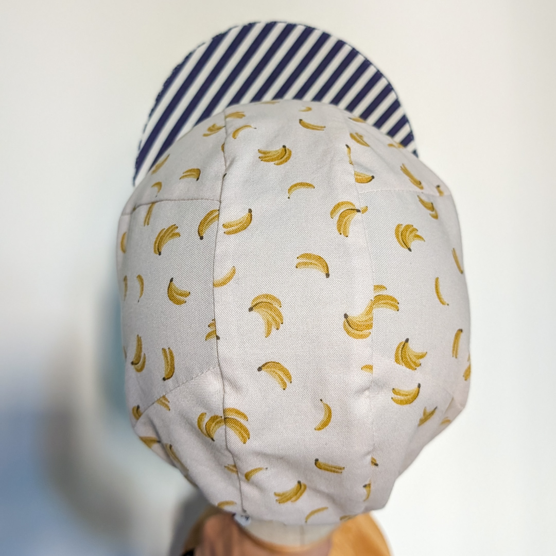 cycling Cap banane mit gestreiftem Schirm